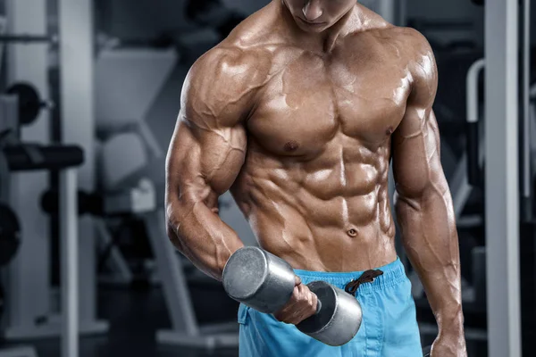 Sexy muscular man working out in gym doing exercises, strong male naked torso abs — Stock Photo, Image