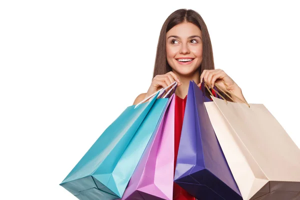 ショッピング バッグ、販売の分離の白い背景美しい幸せな女を笑顔します。 — ストック写真
