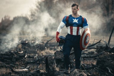 Man dressed as Captain America. Captain America cosplay costume