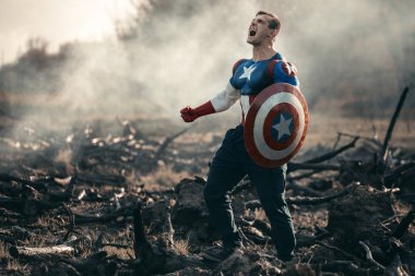 Man dressed as Captain America. Captain America cosplay costume