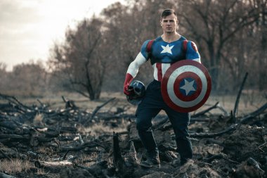Man dressed as Captain America. Captain America cosplay costume