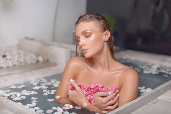 Young Girl Enjoys Spa Treatments Bathroom Flower — Stock Photo, Image