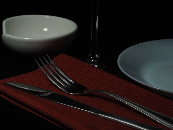 Set Serving Utensils Red Napkin Black Background — Stock Photo, Image