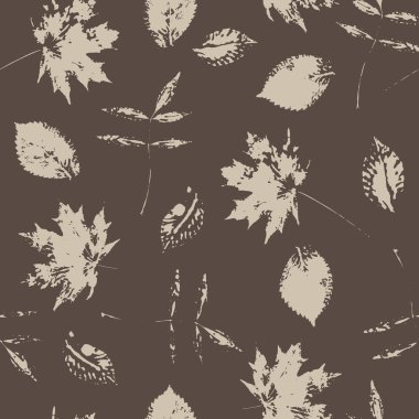 Yaprak kahverengi bir arka plan üzerinde boya ile Seamless Modeli yazdırır
