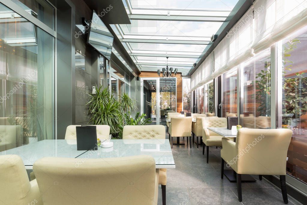 Glazed restaurant terrace interior