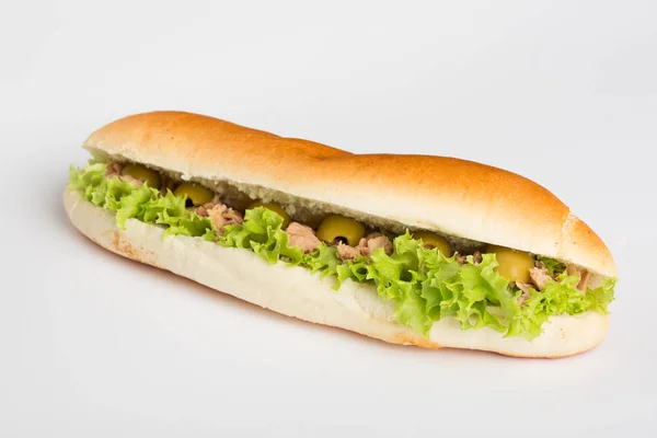 Tuna sandwich in roll with lettuce and olives — Stock Photo, Image
