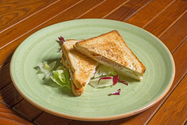 Sandwich served on a plate in hotel restaurant — Stock Photo, Image