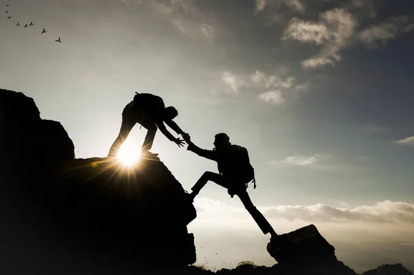 Anda av enighet och kamp för att klättra — Stockfoto