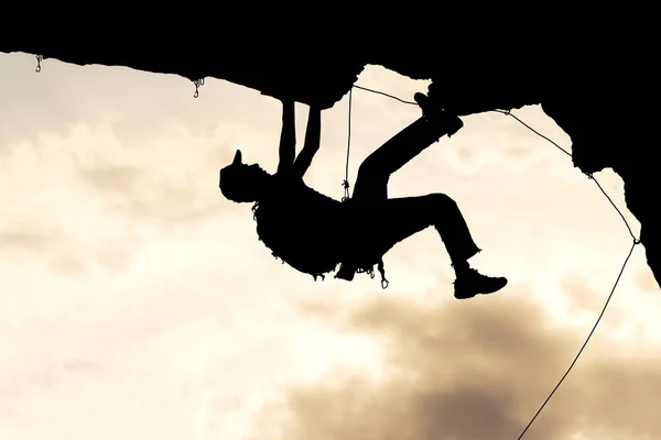 Professional rock climber & climber silhouette — Stock Photo, Image