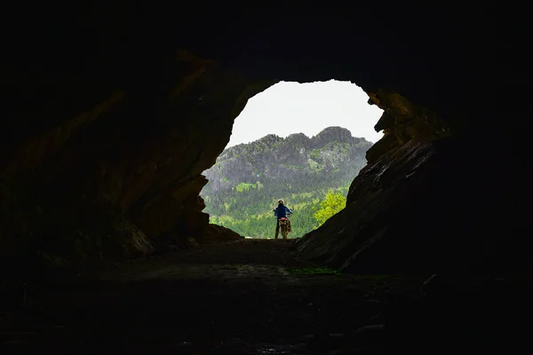 interior of the cave discovery with adventure and motorcycle
