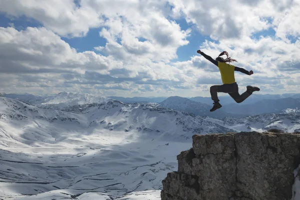 energetic, cheerful and happy climber in the mountains