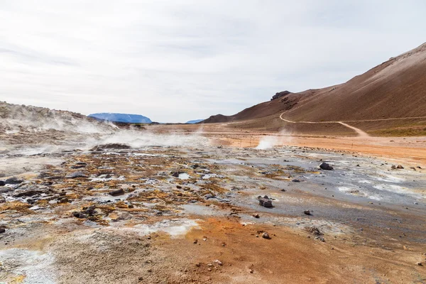 Hverir geothermal area in the north of Iceland near Lake Myvatn, Hot Mud Pots and great landscape in the Geothermal Area Hverir, summer day. — Stock Photo, Image