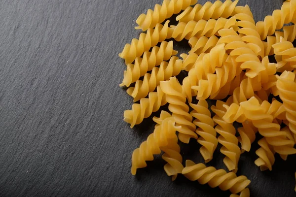 Vermicelli Pasta Spiral Pasta Black Stone Surface — Stock Photo, Image