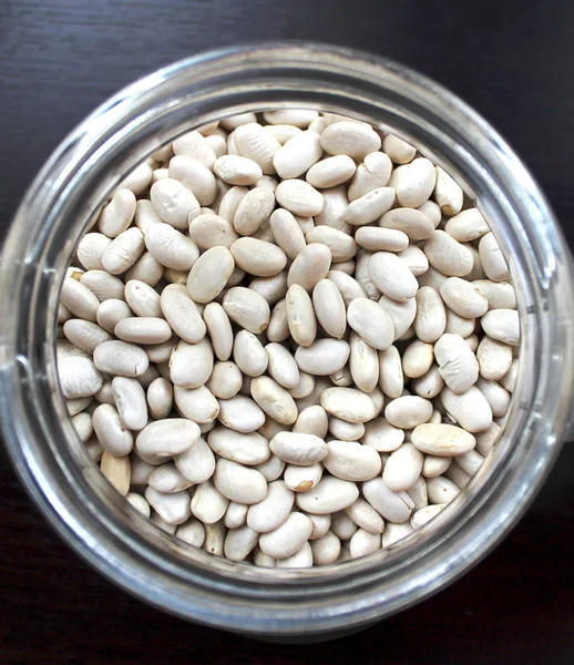 White beans grains in a glass jar