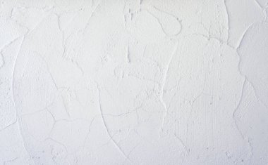 Rastgele desenli çimento alçı işçiliğine sahip sert yüzey beton duvarının beyaz rengi.