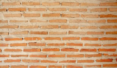 Doğal açık kahverengi kil tuğlalardan oluşan sert yatay çizgi harç beton yapı arka planında