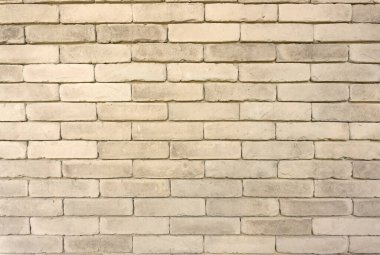 Arka planda gri renkli kil tuğla dokusu duvarı