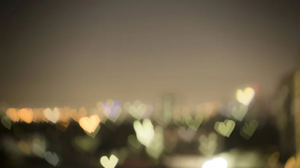 Bokeh Photo Soft Blurred Red Yellow White Hearts Light Shape — Stock Photo, Image