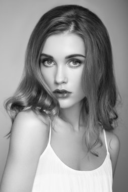 Black and white portrait of young beautiful girl