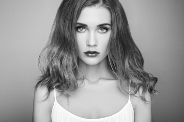 Black and white portrait of young beautiful girl