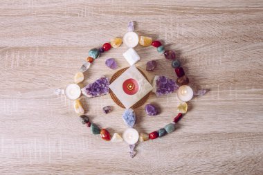 Setting up a semi precious stone crystal grid in home helps your intentions to manifest concept.  clipart