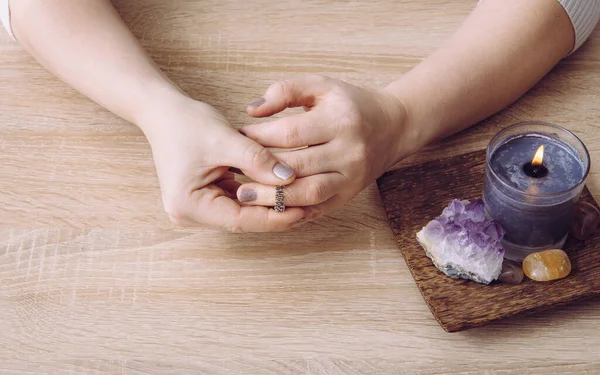 Woman using acupressure massage ring on fingers. Acupressure is an alternative medicine technique with physical pressure is applied to acupuncture points with the aim of clearing blockages. — Stock Image Woman Using Acupressure Massage Ring Fingers Acupressure Alternative Medicine Technique Royalty Free Stock Photos