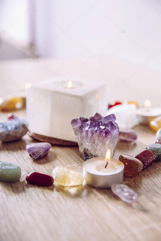 Setting up a semi precious stone crystal grid in home helps your intentions to manifest concept. Alternative lifestyle.