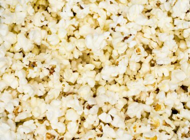 Tüm arka plan güzel sarı patlamış mısırla kaplı..