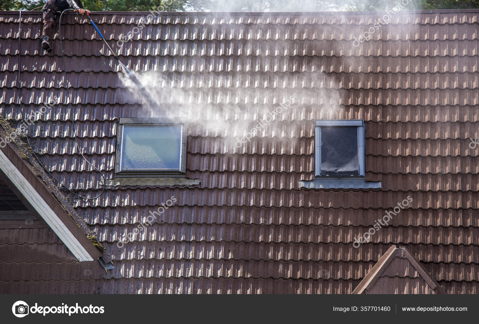 Man Worker Washing Tilted Stone Roof Shingles Water Pressure Washer