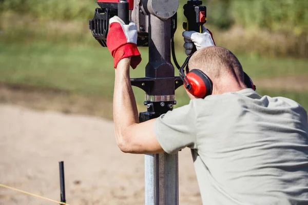 Man Using Gasoline Hand Held Pole Ramming Tool Outdoors Construction — Stock Photo, Image