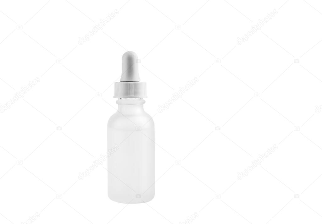 Small white matte medical cosmetic pipette dropper glass bottle isolated on white background. A lot of empty room and space for text.