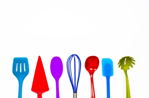 Different Color Kitchen Utensils Isolated Light Background — Stock Photo, Image
