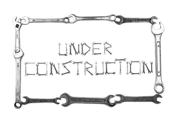 Construction Sign Made Out Old Metal Tool Wrenches Fixing Web — Stock Photo, Image