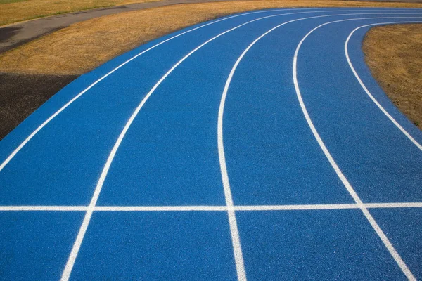 Outdoor Running Court Rubber Flooring. Start/finish line concept.