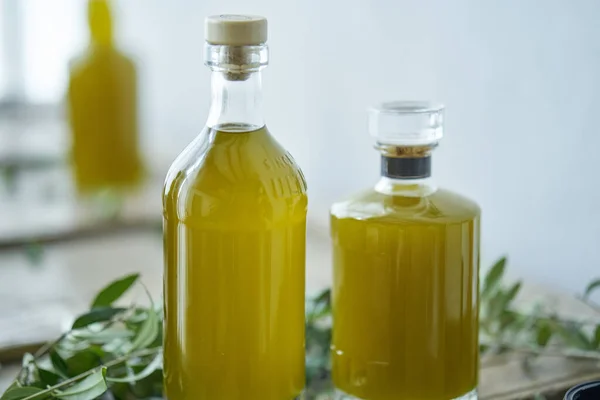 Glass Bottles Filled Golden Liquid Oil Juice Healthy Fresh Rustic — Stock Photo, Image