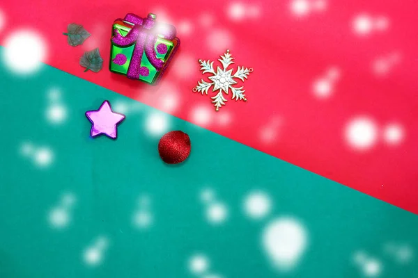 Christmas Bauble Snow Flake Presents Star Leaves Red Green Background — Stock Photo, Image