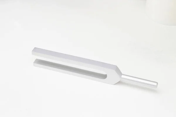 Tuning fork side arrangement on white isolated background