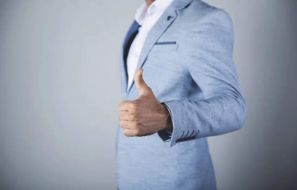 Hombre Negocios Dedo Signo Sobre Fondo Gris —  Fotos de Stock