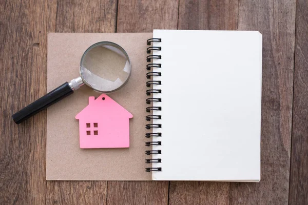 Home Search House Trading Ideas Model House Notebook Magnifying Glass Stock Picture