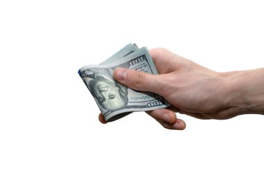 Yüz dolarlık banknotlarla dolu eller.