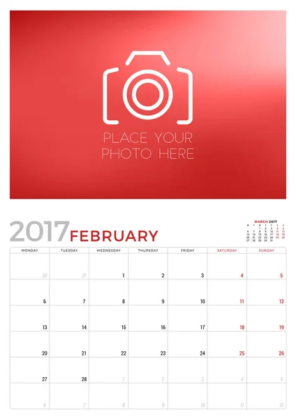 Vägg kalendermall Planner för februari 2017. Veckan börjar måndag. Plats för foto. Pappersvaror Design. Vektorillustration — Stock vektor
