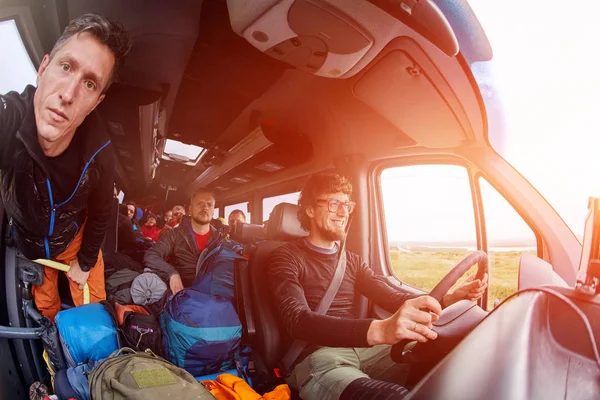 Man photographer in bus — Stock Photo, Image