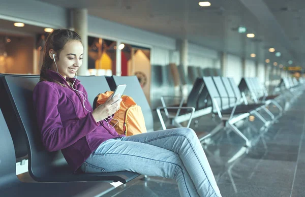 Girl at the airport window