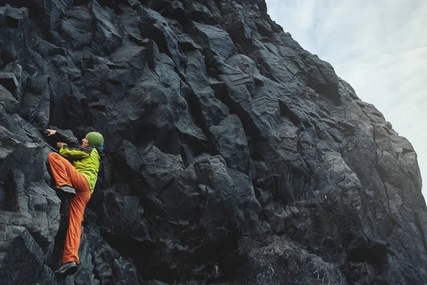 male rock climber on the cliff