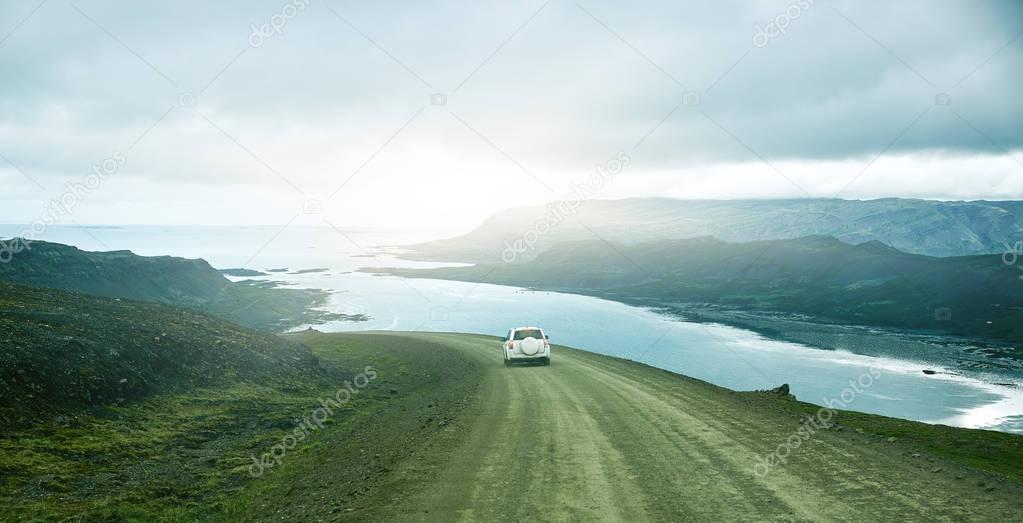 plot of road in a bright sunny mountain landscape