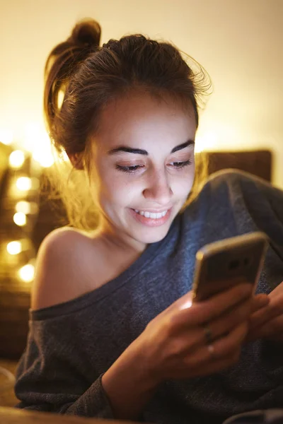 beauty woman using smartphone at home