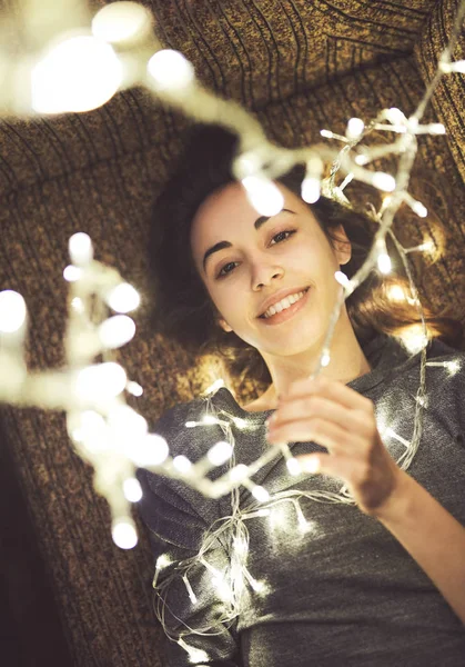 beauty woman with christmas garland