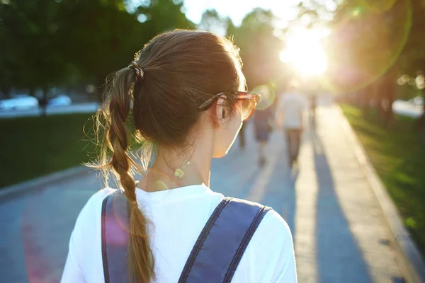 Portrait of a young attractive woman with city backpack — Stock Photo, Image