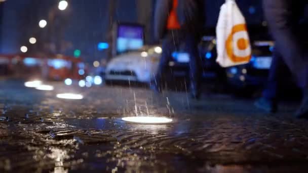 Rain Falling In Slow Motion On City Street witn ground lights At Night. — Stock Video