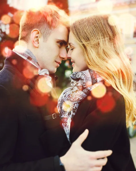 Portrait of young loving couple embracing with eyes closed, close to each other. — Stock Photo, Image